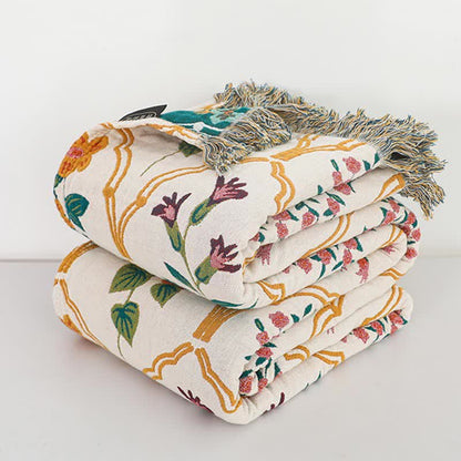 Trapunta reversibile in garza di cotone con motivo floreale a rombi