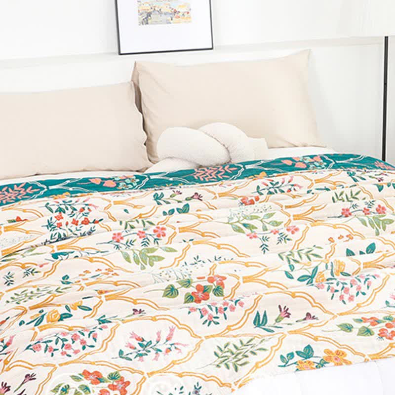 Trapunta reversibile in garza di cotone con motivo floreale a rombi