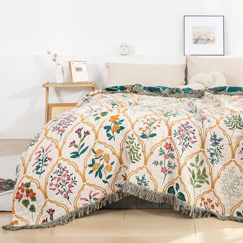 Trapunta reversibile in garza di cotone con motivo floreale a rombi