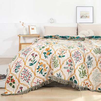 Trapunta reversibile in garza di cotone con motivo floreale a rombi