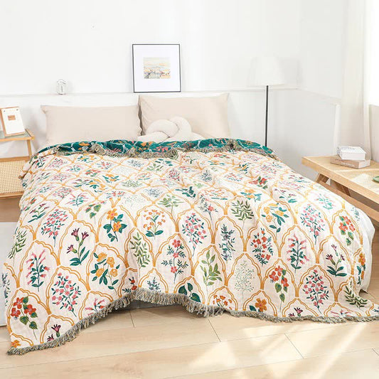 Trapunta reversibile in garza di cotone con motivo floreale a rombi