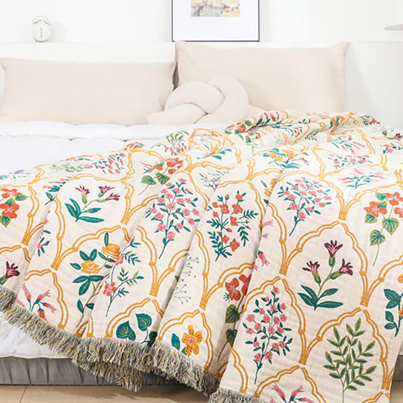 Trapunta reversibile in garza di cotone con motivo floreale a rombi