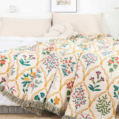 Trapunta reversibile in garza di cotone con motivo floreale a rombi
