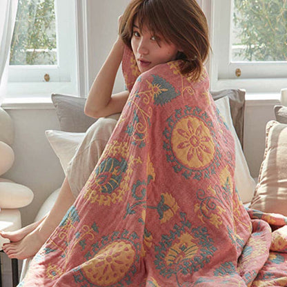 Trapunta reversibile in cotone con stampa floreale colorata