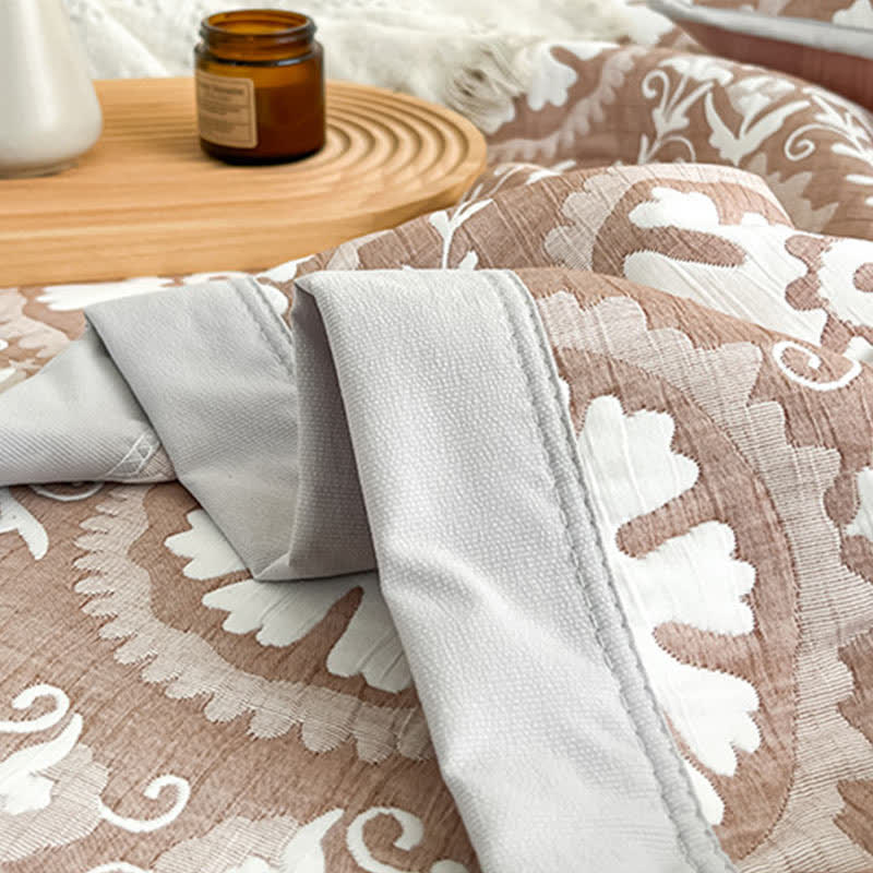 Coperta jacquard con motivo geometrico