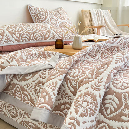 Copriletto jacquard con motivo a foglie geometriche
