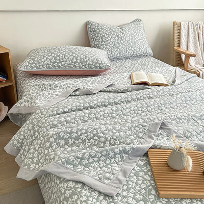 Coperta jacquard con motivo floreale fresco
