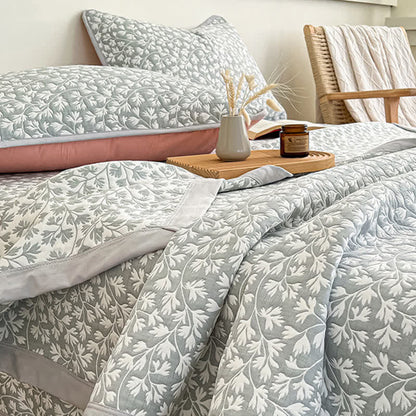 Coperta jacquard con motivo floreale fresco