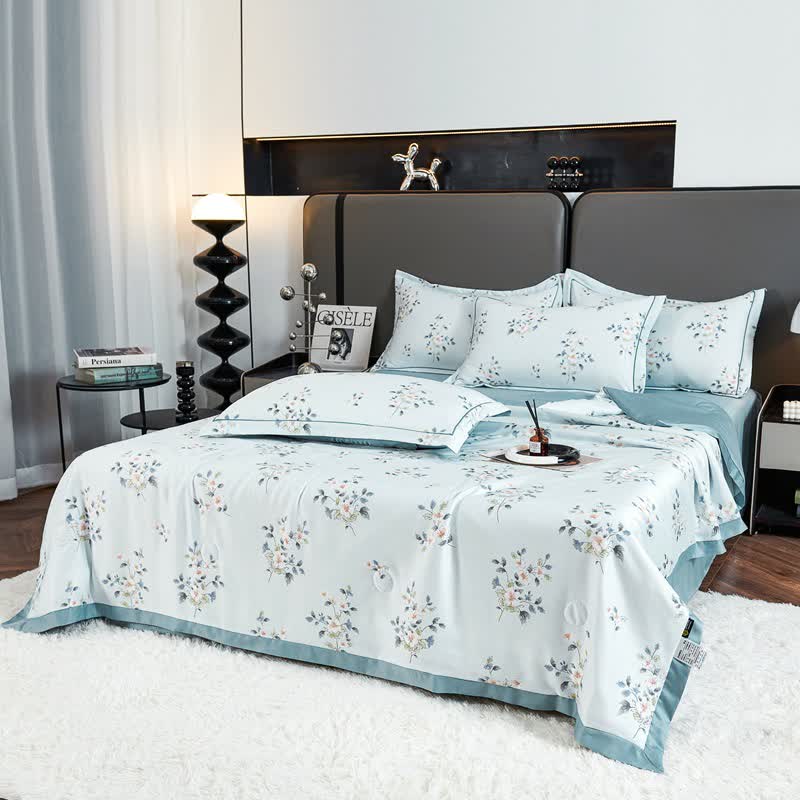 Trapunta estiva morbida con motivo floreale blu rustico
