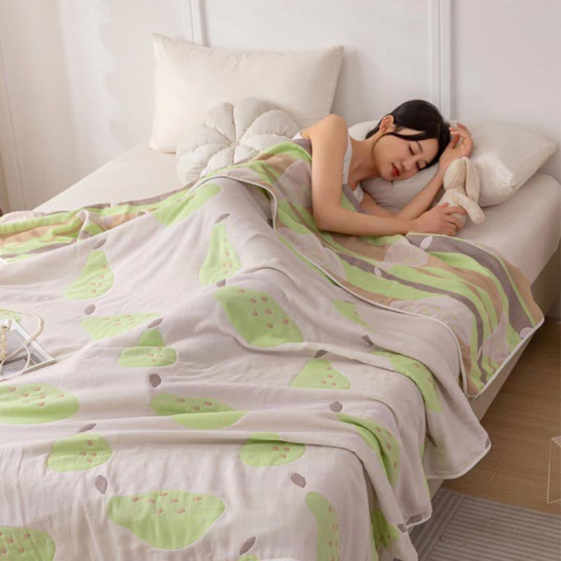 Trapunta reversibile in garza di cotone con motivo frutta in jacquard
