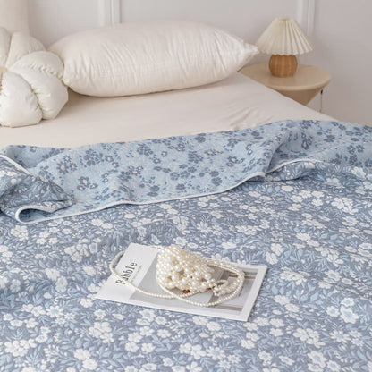Trapunta reversibile in garza di cotone jacquard floreale