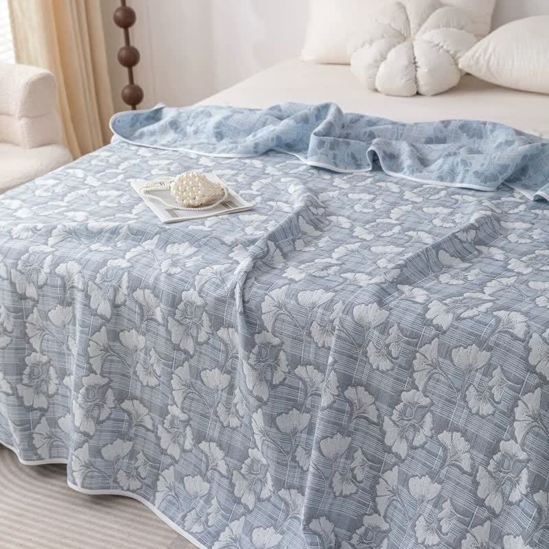 Trapunta jacquard con foglie di ginkgo blu in garza di cotone