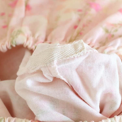 Completo da casa in garza di cotone con stampa a rose e parte anteriore asimmetrica