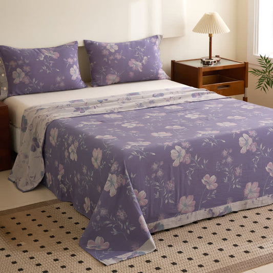 Copriletto reversibile in garza di cotone jacquard floreale
