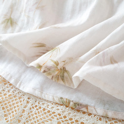 Completo da casa in garza di cotone con stampa di bambù vintage e bottoni in perline