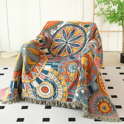 Coperta reversibile con nappe in garza di cotone con motivo floreale artistico
