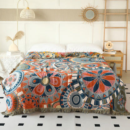 Coperta reversibile con nappe in garza di cotone con motivo floreale artistico