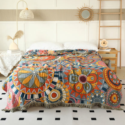 Coperta reversibile con nappe in garza di cotone con motivo floreale artistico