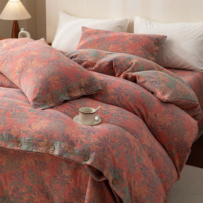 Set di biancheria da letto reversibile in cotone con bottoni floreali jacquard (4 pezzi)