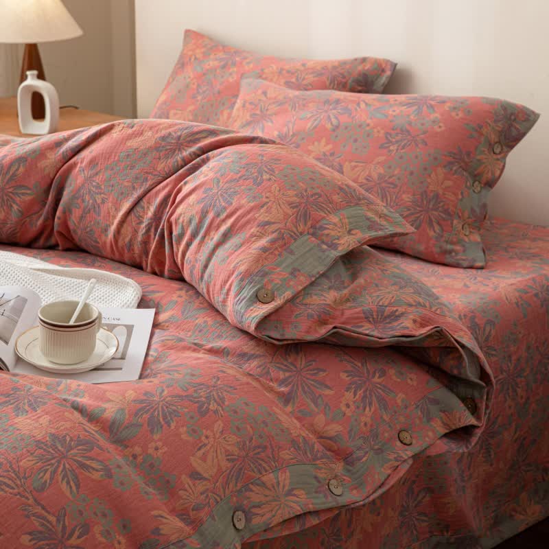 Set di biancheria da letto reversibile in cotone con bottoni floreali jacquard (4 pezzi)