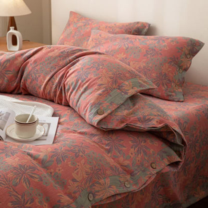 Set di biancheria da letto reversibile in cotone con bottoni floreali jacquard (4 pezzi)