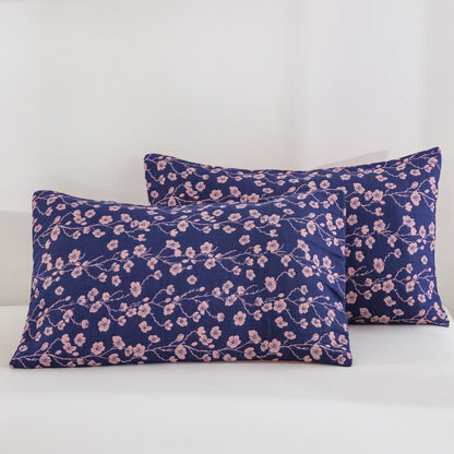 Trapunta reversibile in garza di cotone jacquard con motivo floreale pastorale