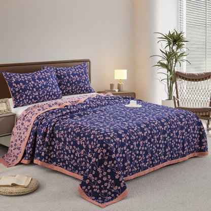 Trapunta reversibile in garza di cotone jacquard con motivo floreale pastorale - image 1