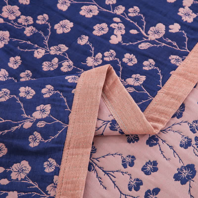 Trapunta reversibile in garza di cotone jacquard con motivo floreale pastorale