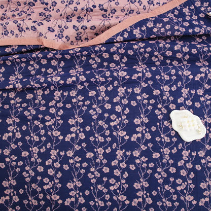 Trapunta reversibile in garza di cotone jacquard con motivo floreale pastorale