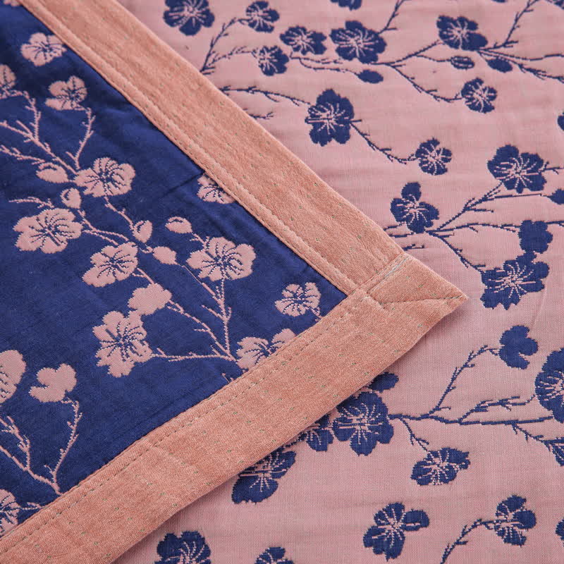 Trapunta reversibile in garza di cotone jacquard con motivo floreale pastorale