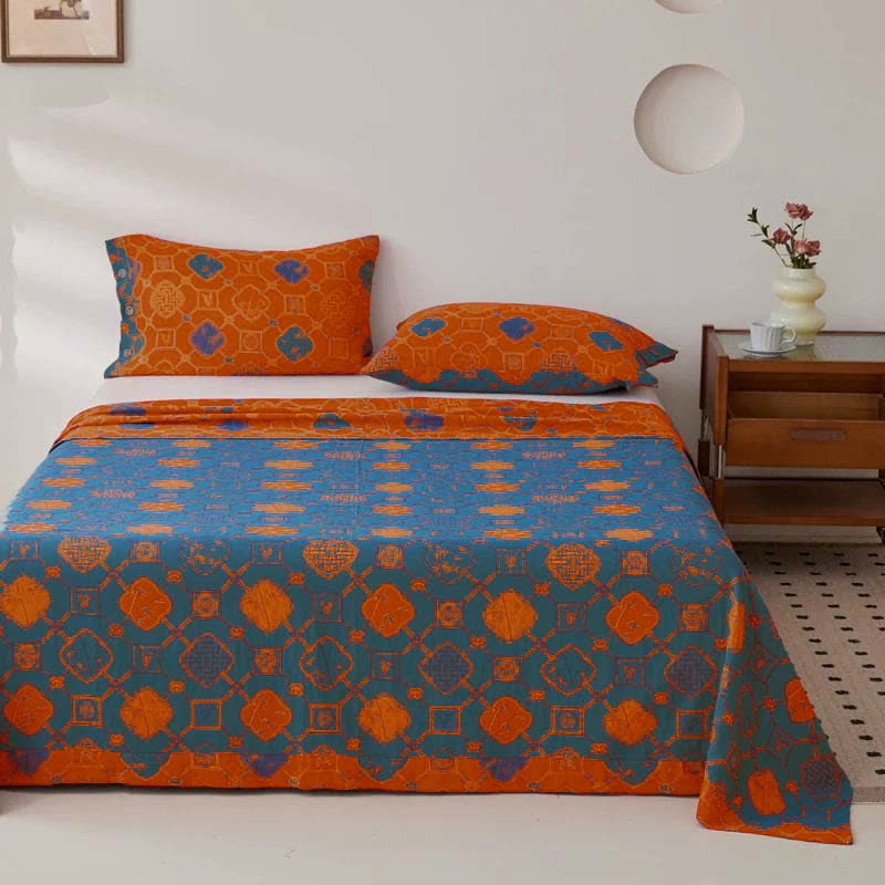 Copriletto reversibile in garza di cotone retrò tinto in filo jacquard