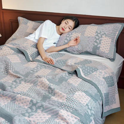 Copriletto in mussola di cotone con stampa a quadri patchwork