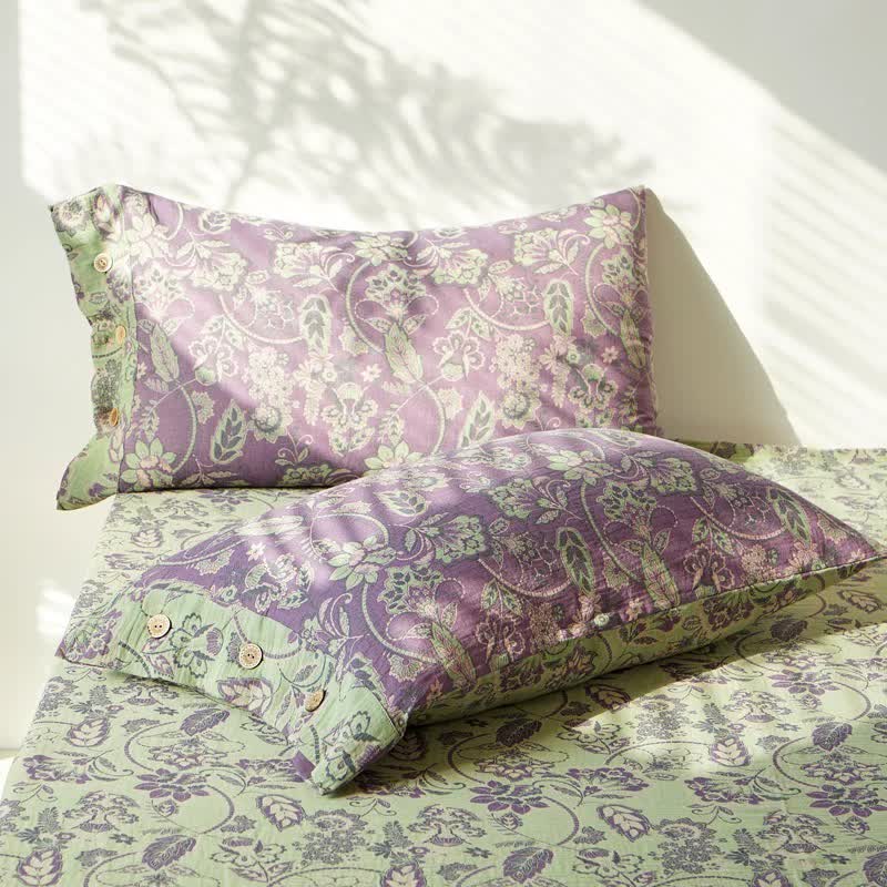 Copriletto in garza di cotone jacquard con motivo floreale astratto