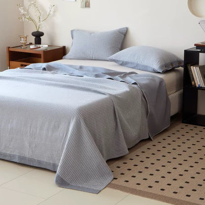 Copriletto jacquard in doppia garza di cotone a quadri