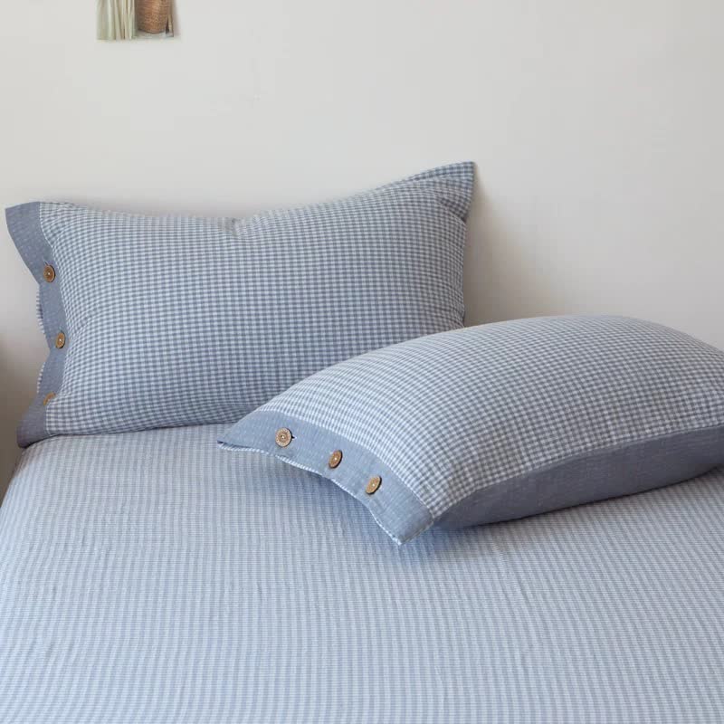 Copriletto jacquard in doppia garza di cotone a quadri