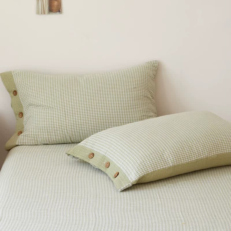Copriletto jacquard in doppia garza di cotone a quadri