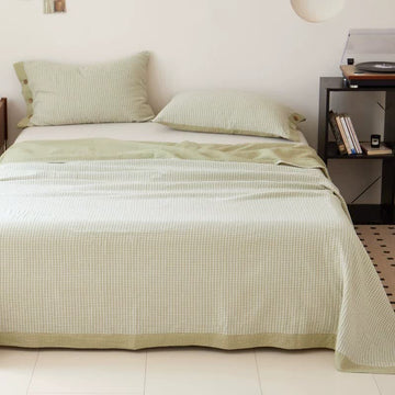 Copriletto jacquard in doppia garza di cotone a quadri