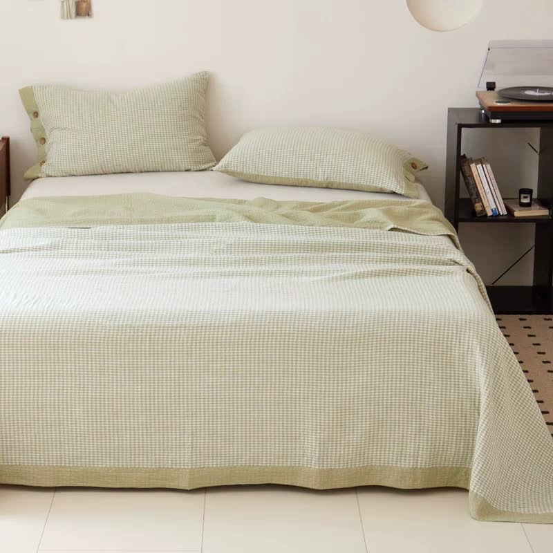 Copriletto jacquard in doppia garza di cotone a quadri