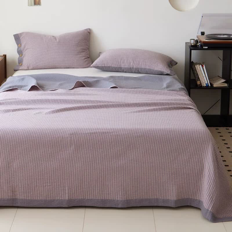 Copriletto jacquard in doppia garza di cotone a quadri