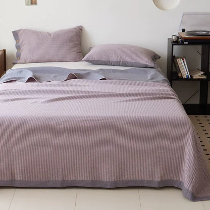 Copriletto jacquard in doppia garza di cotone a quadri