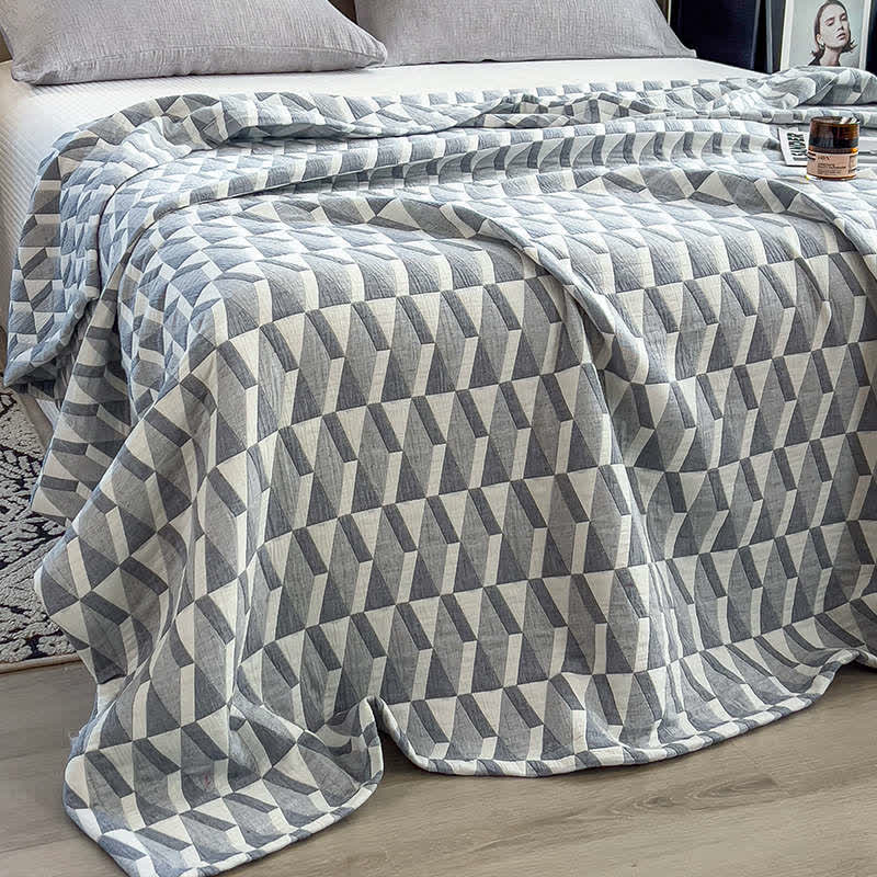 Trapunta in mussola di cotone con stampa geometrica a triangolo