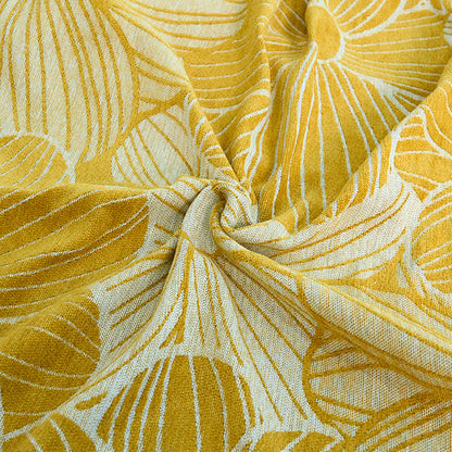 Coperta in ciniglia jacquard con nappe e motivo a margherita
