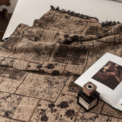 Trapunta in mussola di cotone con patchwork a quadri floreali