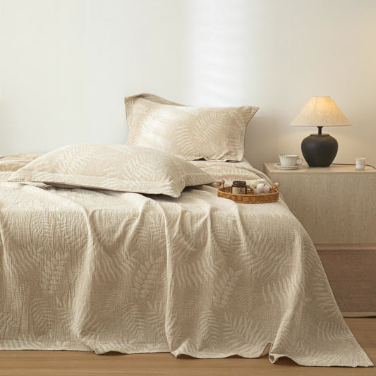 Copriletto in lino e cotone testurizzato beige con motivo botanico