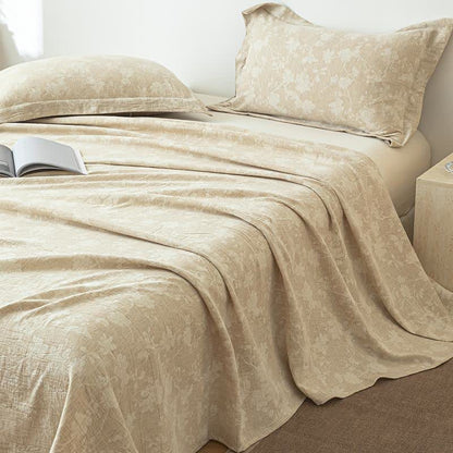 Copriletto in lino e cotone testurizzato con motivo floreale beige