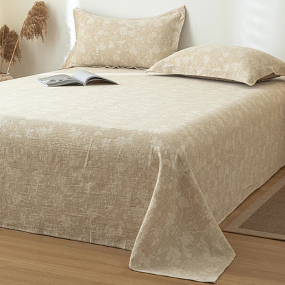 Copriletto in lino e cotone testurizzato con motivo floreale beige