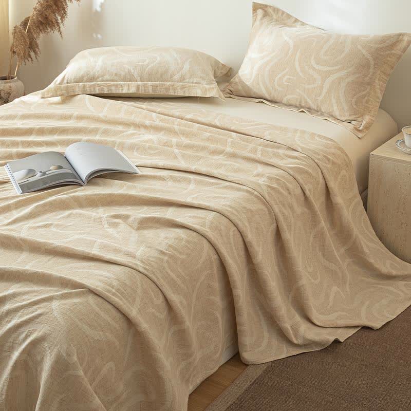 Copriletto in lino e cotone testurizzato beige curvo