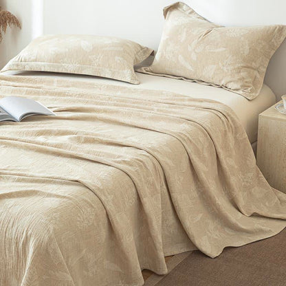 Copriletto in cotone e lino con texture Jungle Leaves
