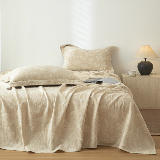 Copriletto in cotone e lino con texture Jungle Leaves