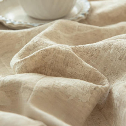 Copriletto in lino e cotone testurizzato con motivo floreale beige